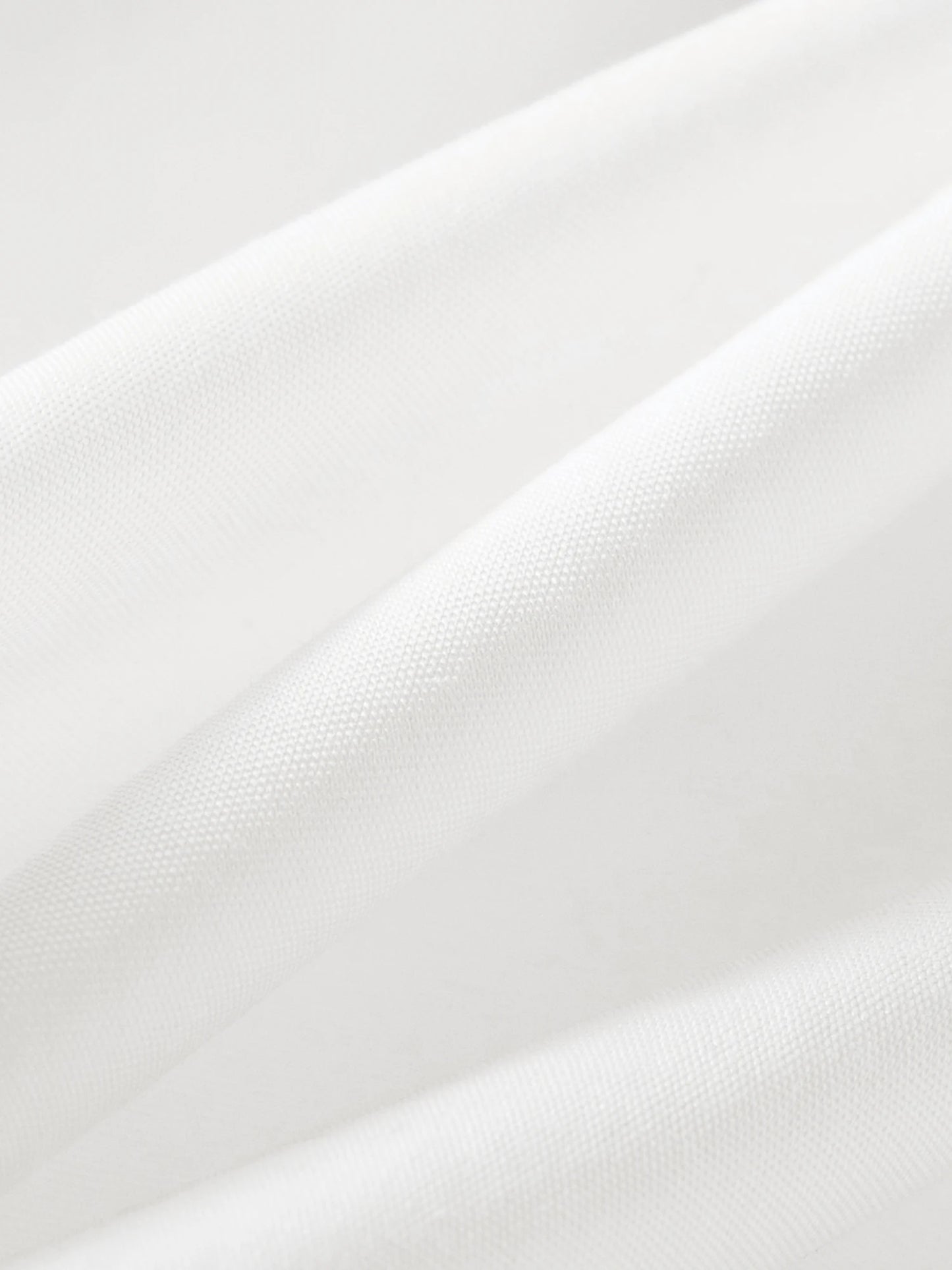 White Ruffle Hem Cotton Blouse
