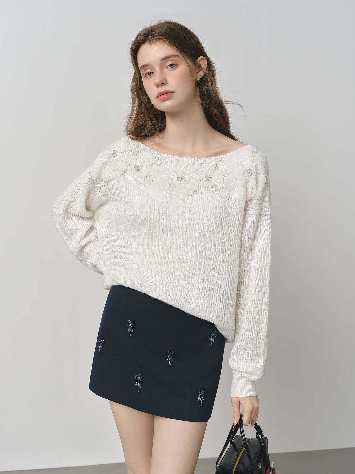 SWEATERS